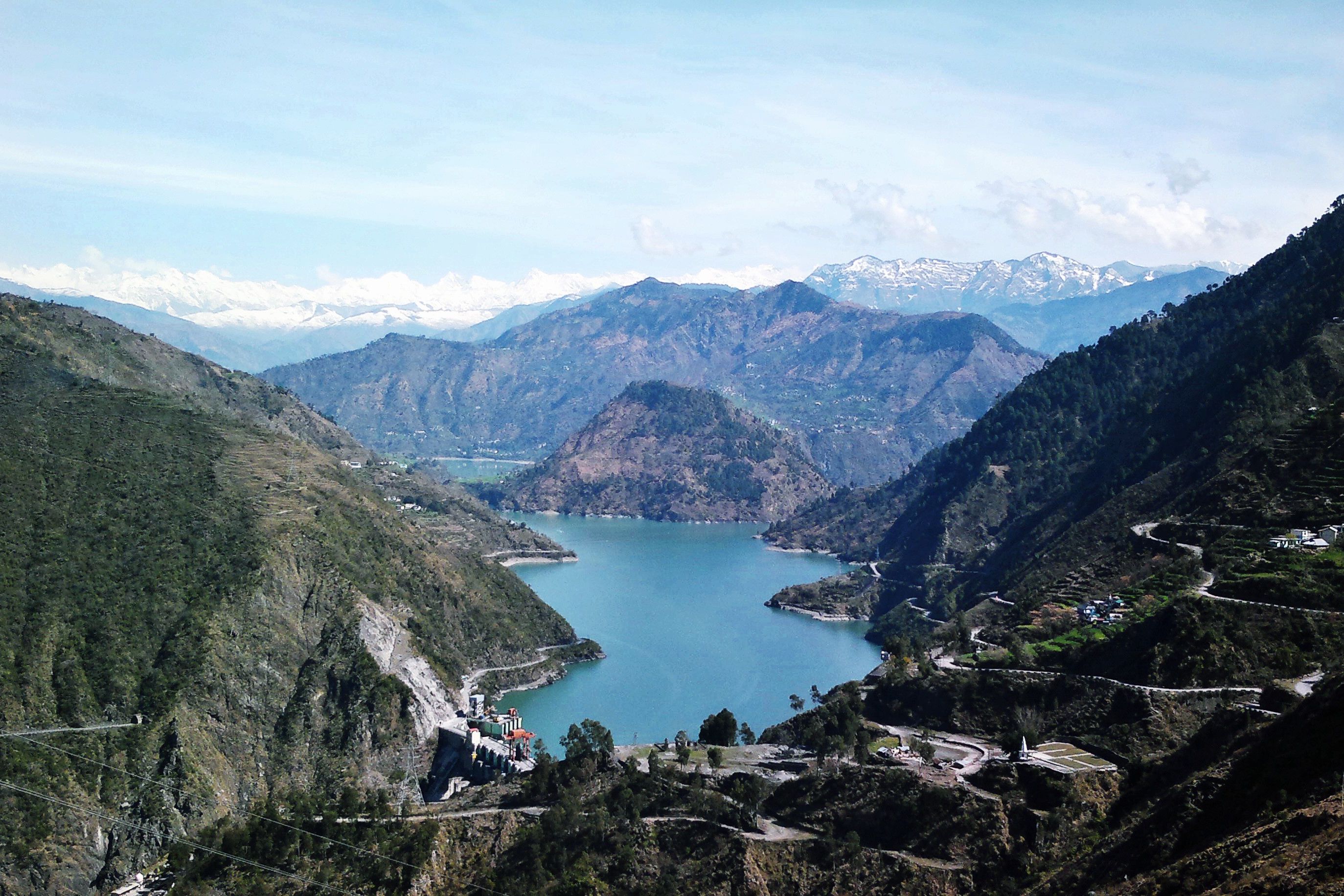 chamera lake with pir panjal mountain range in the background