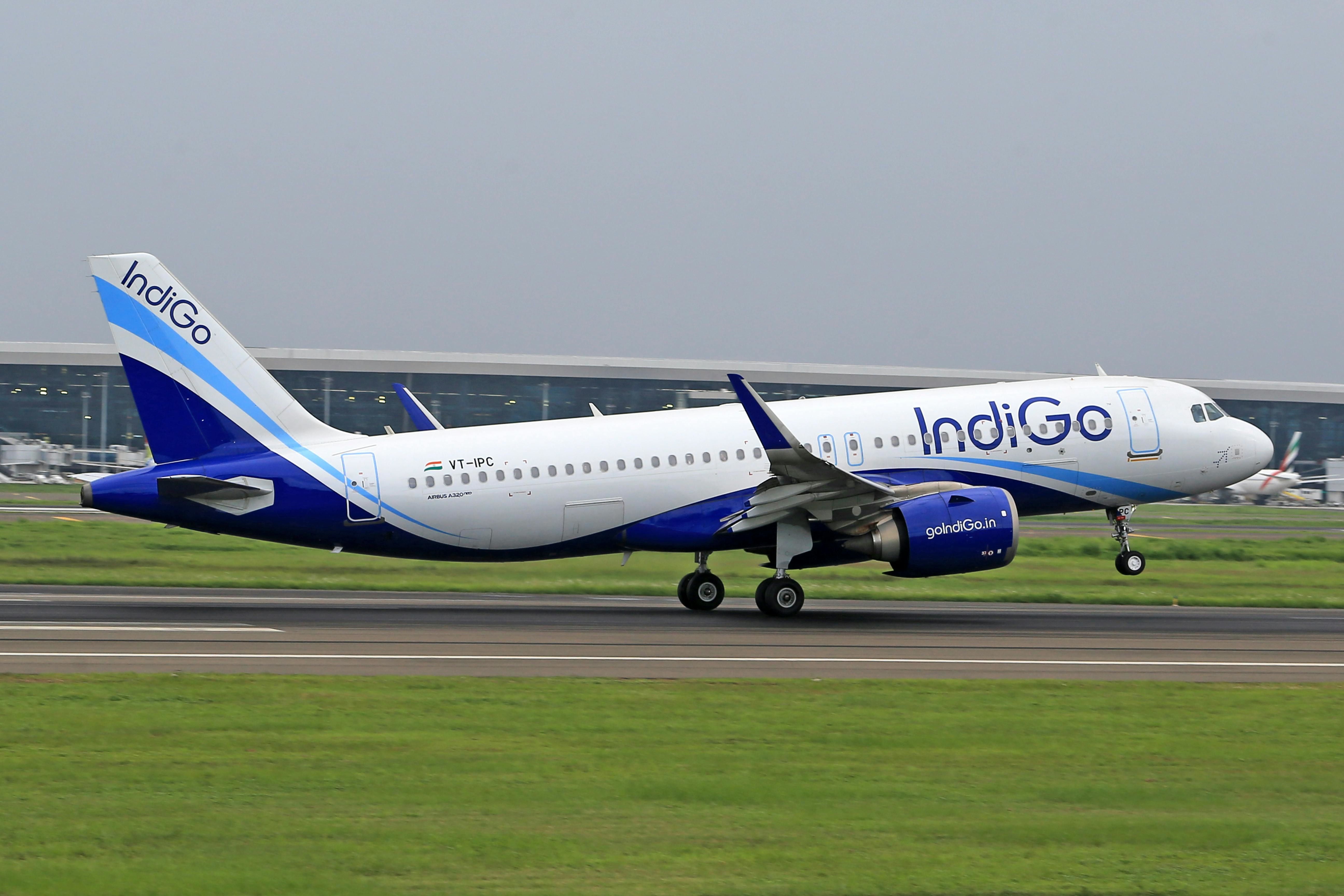 an indigo aeroplane on an airport