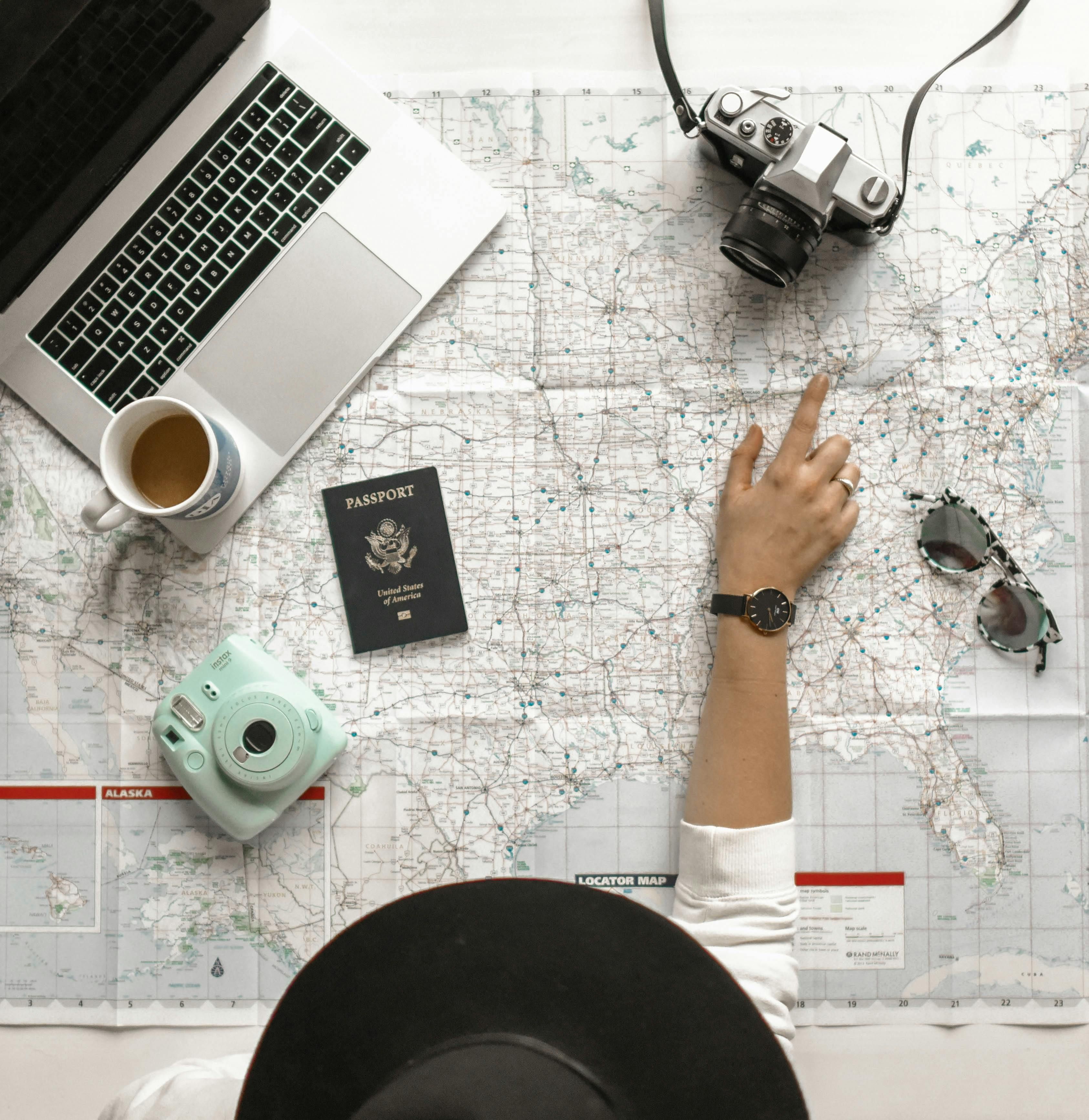 a person pointing to a location on the map