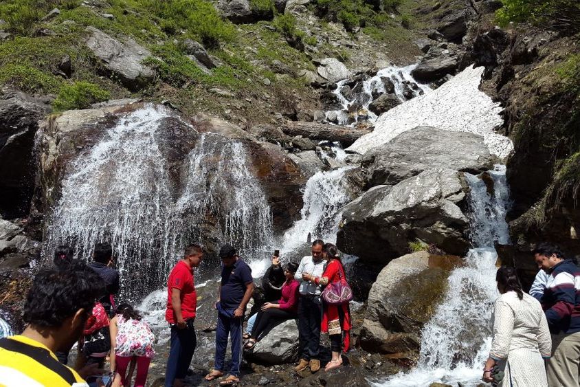 people standing near rahala waterfall during daytime