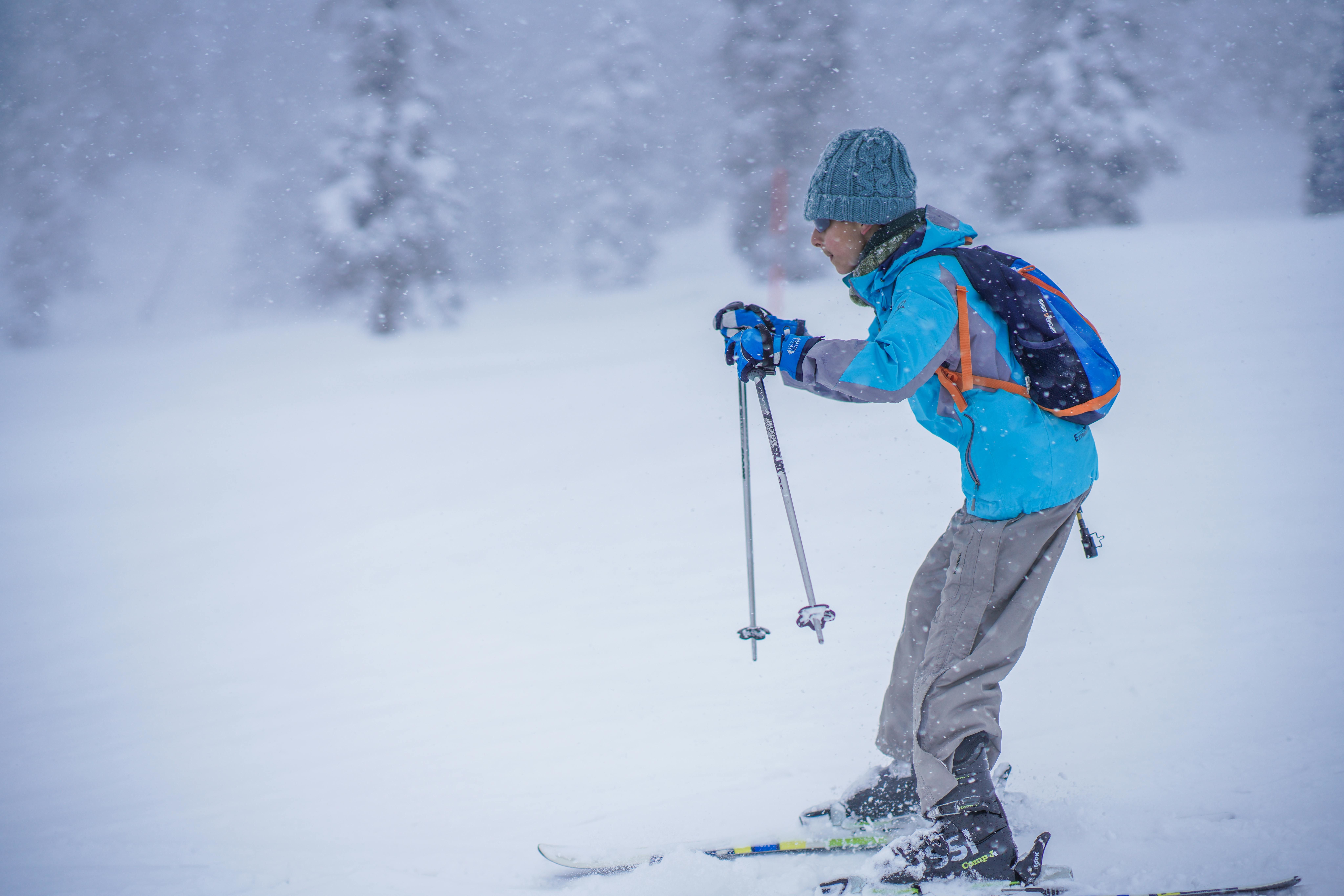 woman skiing in winter scenery in gulmarg